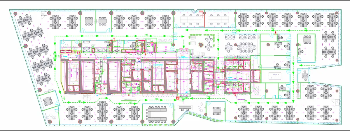 Floor plan showing desks, rooms and circulation routes